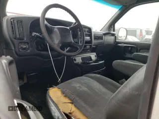 2002 GMC Savana z VIN 1GTGG25R521903285, wystawiony jako Copart lot #66774134 z przebiegiem 145 202 mil mil oraz Szkody całkowita. Historia ofert i sprzedaży dostępna na DreamBid. Obrazek 8.
