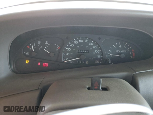1998 Ford Escort ZX2 Cool z VIN 3FAKP1134WR235941, wystawiony jako Copart lot #50360675 z przebiegiem 111 687 mil mil oraz Szkoda całkowita • Salvage title. Historia ofert i sprzedaży dostępna na DreamBid. Obrazek 9.