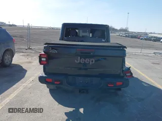 2020 Jeep Gladiator Rubicon with VIN 1C6JJTBG9LL152141, listed as a IAAI auction lot 41798487 with 78,585 mi miles and . Bid and sale history available at DreamBid. Image 16.
