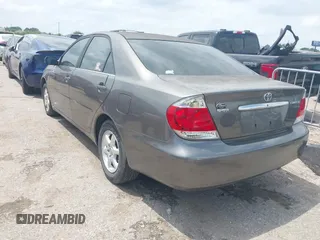 2006 Toyota Camry STD with VIN JTDBE32K163047233, listed as a IAAI auction lot 42088552 with 137,973 mi miles. Bid and sale history available at carsss.com. Image 3.