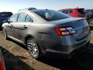 2014 Ford Taurus Limited with VIN 1FAHP2F8XEG163430, listed as a Copart auction lot 55357205 with 150,841 mi miles and Salvage title. Bid and sale history available at DreamBid. Image 2.