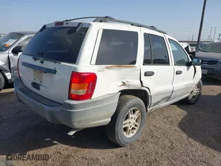 1999 Jeep Grand Cherokee Laredo with VIN 1J4GW58S9XC510088, listed as a IAAI auction lot 41724456 with 1 mi miles. Bid and sale history available at carsss.com. Image 4.