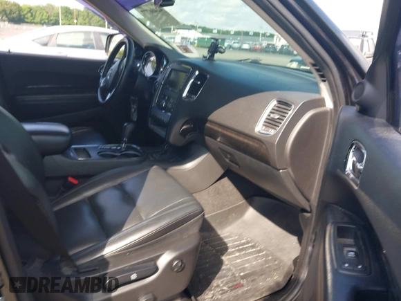 2013 Dodge Durango Crew with VIN 1C4RDJDG8DC675558, listed as a IAAI auction lot 42466777 with 160,407 mi miles and . Bid and sale history available at DreamBid. Image 5.