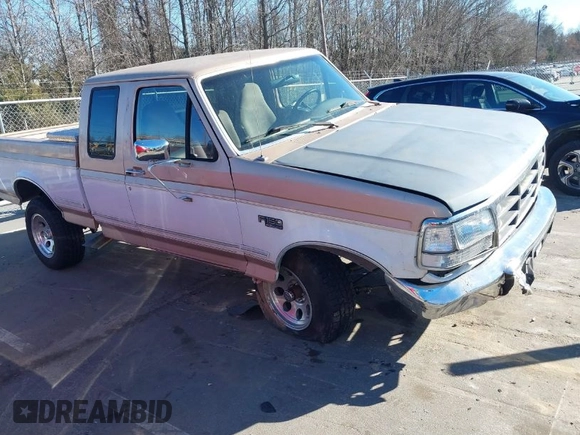 1996 Ford F-150 with VIN 1FTEX14N4TKA28292, listed as a IAAI auction lot 41422154 with 173,728 mi miles. Bid and sale history available at carsss.com. Image 1.