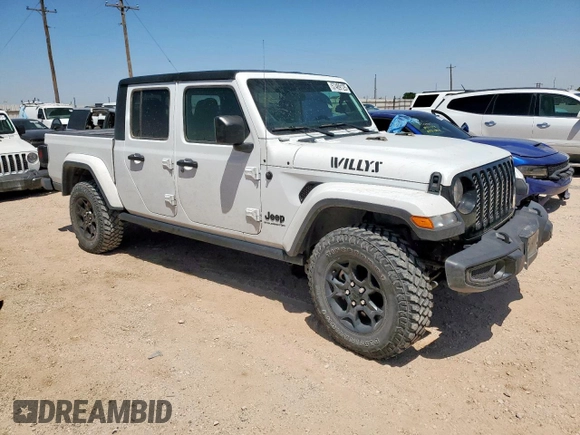 2023 Jeep Gladiator Sport S with VIN 1C6HJTAG4PL564716, listed as a Copart auction lot 57489125 with 20,971 mi miles and Salvage title. Bid and sale history available at DreamBid. Image 4.
