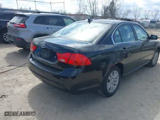2010 Kia Optima LX with VIN KNAGG4A88A5436716, listed as a IAAI auction lot 41890607 with 264,913 mi miles. Bid and sale history available at carsss.com. Image 4.