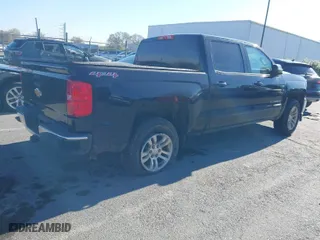 2017 Chevrolet Silverado 1500 LT with VIN 3GCUKREC9HG315955, listed as a IAAI auction lot 41863754 with 235,593 mi miles. Bid and sale history available at carsss.com. Image 4.