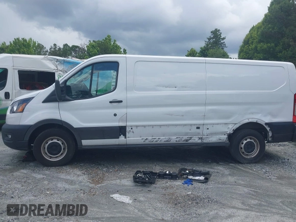2021 Ford Transit Cargo with VIN 1FTBR1Y83MKA76305, listed as a IAAI auction lot 42240276 with 75,256 mi miles and . Bid and sale history available at DreamBid. Image 14.