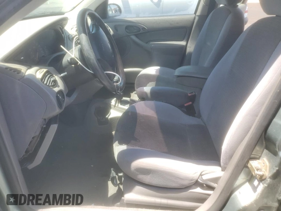 2004 Ford Focus SE with VIN 1FAFP36384W191801, listed as a Copart auction lot 63661465 with 144,226 mi miles and Salvage title. Bid and sale history available at DreamBid. Image 7.