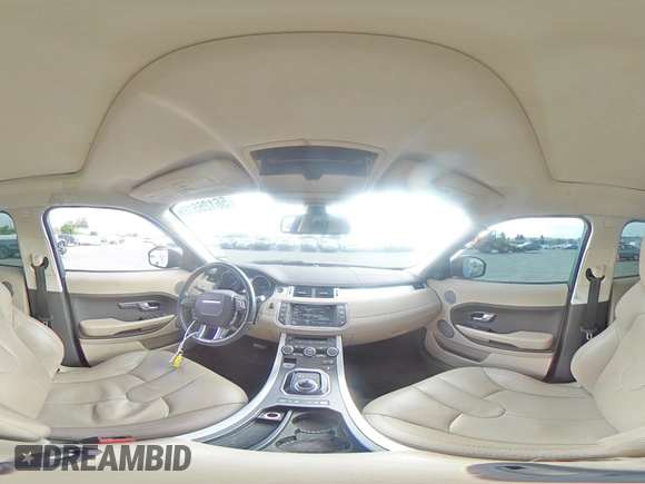 2015 Land Rover Range Rover Evoque Pure Plus с VIN SALVP2BG6FH076073, выставлен на аукционе Copart как лот 56125515 с пробегом 125 139 миль миль и Списание • Salvage title. История ставок и продаж доступна на DreamBid. Изображение 15.