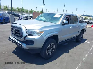 2022 Toyota Tacoma SR with VIN 3TYAX5GN4NT037625, listed as a IAAI auction lot 42382411 with 49,703 mi miles and . Bid and sale history available at DreamBid. Image 2.