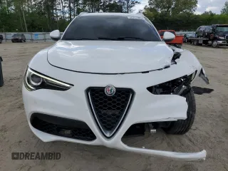 2018 Alfa Romeo Stelvio z VIN ZASFAKAN3J7B89286, wystawiony jako Copart lot #55717365 z przebiegiem 81 672 mil mil oraz Szkoda całkowita • Salvage title. Historia ofert i sprzedaży dostępna na DreamBid. Obrazek 5.