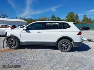 2021 Volkswagen Tiguan S with VIN 3VV1B7AX9MM056025, listed as a IAAI auction lot 41352521 with 98,944 mi miles. Bid and sale history available at carsss.com. Image 14.