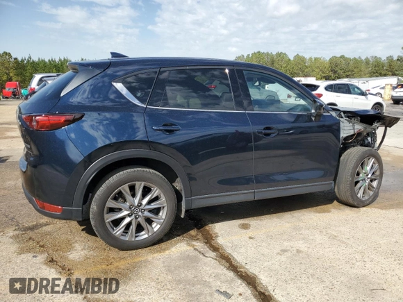 2021 Mazda CX-5 Grand Touring with VIN JM3KFBDM8M0489180, listed as a Copart auction lot 49900525 with 34,687 mi miles and Salvage Title. Bid and sale history available at carsss.com. Image 3.