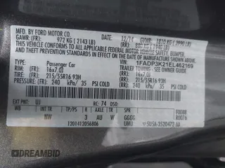 2014 Ford Focus SE with VIN 1FADP3K21EL462169, listed as a IAAI auction lot 42145524 with 100,156 mi miles. Bid and sale history available at carsss.com. Image 9.