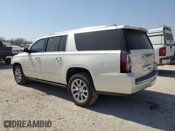 2015 GMC Yukon XL Denali with VIN 1GKS2JKJ3FR585809, listed as a Copart auction lot 48219925 with 191,102 mi miles and Salvage Title. Bid and sale history available at DreamBid. Image 2.
