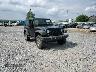 2014 Jeep Wrangler Sport with VIN 1C4AJWAG5EL307945, listed as a Copart auction lot 60152035 with 119,508 mi miles and Salvage title. Bid and sale history available at DreamBid. Image 15.