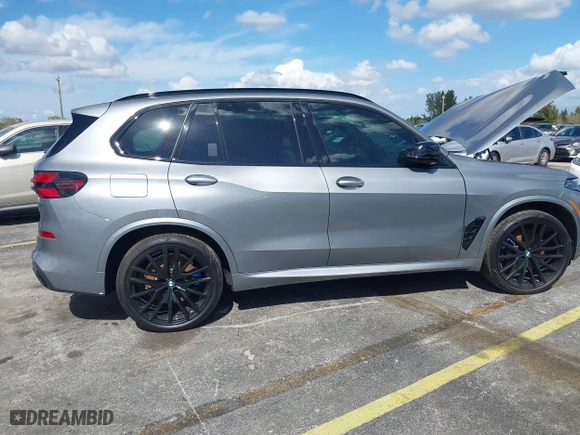 2025 BMW X5 M60i with VIN 5UX33EU03S9X62019, listed as a IAAI auction lot 41623189 with 5,749 mi miles. Bid and sale history available at carsss.com. Image 13.