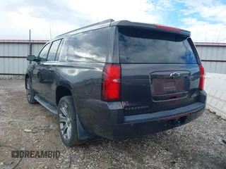 2015 Chevrolet Suburban LT with VIN 1GNSKJKC8FR717435, listed as a IAAI auction lot 41313726 with 120,731 mi miles and . Bid and sale history available at DreamBid. Image 3.