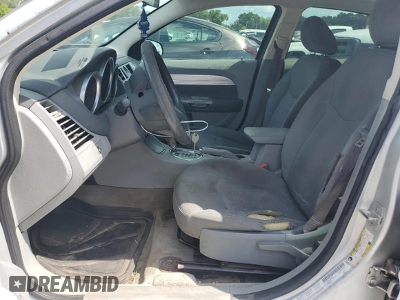 2007 Chrysler Sebring Touring z VIN 1C3LC56K27N546794, wystawiony jako Copart lot #52743265 z przebiegiem 247 352 mil mil oraz Szkoda całkowita • Salvage title. Historia ofert i sprzedaży dostępna na DreamBid. Obrazek 7.