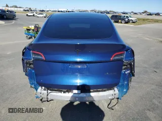 2021 Tesla Model Y Long Range z VIN 5YJYGDEE6MF089493, wystawiony jako Copart lot #48349575 z przebiegiem 52 245 mil mil oraz Szkoda całkowita • Salvage title. Historia ofert i sprzedaży dostępna na DreamBid. Obrazek 6.
