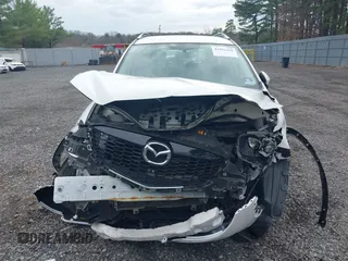 2014 Mazda CX-5 Sport with VIN JM3KE4BE3E0300849, listed as a IAAI auction lot 41942418 with 144,310 mi miles. Bid and sale history available at carsss.com. Image 12.