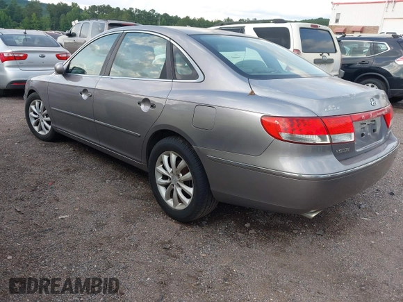 2006 Hyundai Azera SE with VIN KMHFC46F76A043396, listed as a IAAI auction lot 42398355 with 232,418 mi miles and . Bid and sale history available at DreamBid. Image 3.