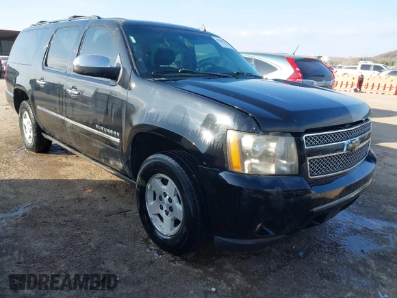2010 Chevrolet Suburban LTZ with VIN 1GNUCKE07AR276807, listed as a IAAI auction lot 40987330 with 196,618 mi miles. Bid and sale history available at carsss.com. Image 1.