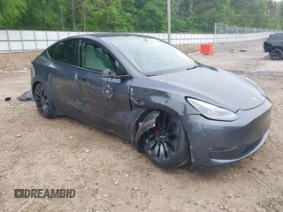 2022 Tesla Model Y Performance z VIN 7SAYGDEF9NF377005, wystawiony jako IAAI lot #42091876 z przebiegiem 45 671 mil mil oraz . Historia ofert i sprzedaży dostępna na DreamBid. Obrazek 1.