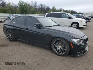 2014 BMW 3 Series 335i xDrive with VIN WBA3B9C55EF588272, listed as a Copart auction lot 58565145 with 88,085 mi miles and Salvage title. Bid and sale history available at DreamBid. Image 4.