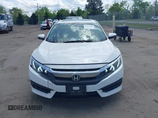 2016 Honda Civic EX with VIN 19XFC2F74GE081734, listed as a IAAI auction lot 42157310 with 152,475 mi miles and . Bid and sale history available at DreamBid. Image 12.