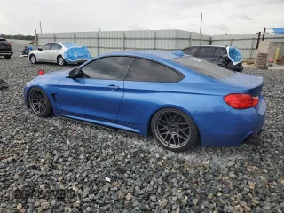 2014 BMW 4 Series 435i xDrive with VIN WBA3R5C50EK187272, listed as a Copart auction lot 56579855 with 129,873 mi miles and Salvage title. Bid and sale history available at DreamBid. Image 2.