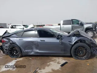 2021 Tesla Model S Plaid z VIN 5YJSA1E6XMF429436, wystawiony jako IAAI lot #41826114 z przebiegiem Nie podano mil oraz . Historia ofert i sprzedaży dostępna na DreamBid. Obrazek 13.