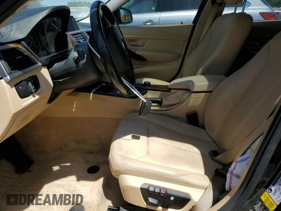 2013 BMW 3 Series 335i xDrive with VIN WBA3B9C51DF587019, listed as a Copart auction lot 59373025 with 118,723 mi miles and Salvage title. Bid and sale history available at DreamBid. Image 7.