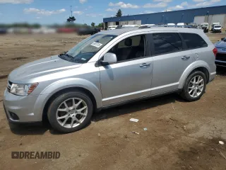 2013 Dodge Journey R/T с VIN 3C4PDDFG3DT606514, выставлен на аукционе Copart как лот 65601315 с пробегом 129 236 миль миль и Чистый • Clean title. История ставок и продаж доступна на DreamBid. Изображение 1.