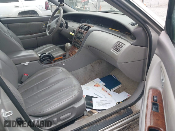 2001 Toyota Avalon XL z VIN 4T1BF28B91U144533, wystawiony jako IAAI lot #42247586 z przebiegiem 207 775 mil mil oraz . Historia ofert i sprzedaży dostępna na DreamBid. Obrazek 5.