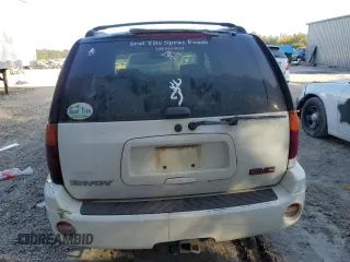 2002 GMC Envoy SLT with VIN 1GKDS13S822460095, listed as a Copart auction lot 77004764 with 267,716 mi miles and Salvage Title. Bid and sale history available at carsss.com. Image 6.