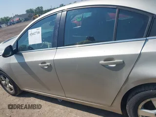 2014 Chevrolet Cruze 1LT с VIN 1G1PC5SB5E7214863, выставлен на аукционе IAAI как лот 42642718 с пробегом 132 939 миль миль и . История ставок и продаж доступна на DreamBid. Изображение 15.