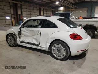 2012 Volkswagen Beetle 2.5L PZEV with VIN 3VWJP7AT3CM610930, listed as a Copart auction lot 79702664 with 0 mi miles and Salvage Title. Bid and sale history available at carsss.com. Image 2.