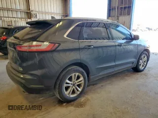 2019 Ford Edge SEL z VIN 2FMPK3J96KBC72783, wystawiony jako Copart lot #57761175 z przebiegiem 153 590 mil mil oraz Czysty tytuł • Clean title. Historia ofert i sprzedaży dostępna na DreamBid. Obrazek 3.