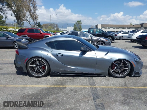 2022 Toyota Supra 3.0 z VIN WZ1DB0C03NW050498, wystawiony jako IAAI lot #41950538 z przebiegiem 42 449 mil mil oraz . Historia ofert i sprzedaży dostępna na DreamBid. Obrazek 13.
