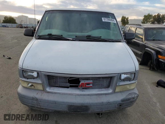 2001 GMC Safari Cargo with VIN 1GTDM19W71B510158, listed as a Copart auction lot 87296804 with 214,236 mi miles and Salvage Title. Bid and sale history available at carsss.com. Image 5.