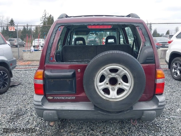 2002 Chevrolet Tracker with VIN 2CNBJ13C626925583, listed as a IAAI auction lot 41636212 with NaN miles. Bid and sale history available at carsss.com. Image 16.