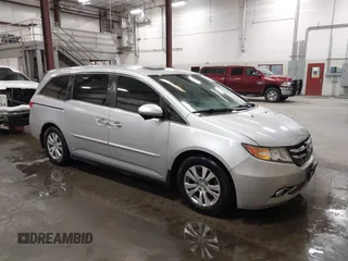 2015 Honda Odyssey EX-L with VIN 5FNRL5H66FB028822, listed as a IAAI auction lot 42067242 with 122,354 mi miles and . Bid and sale history available at carsss.com. Image 1.