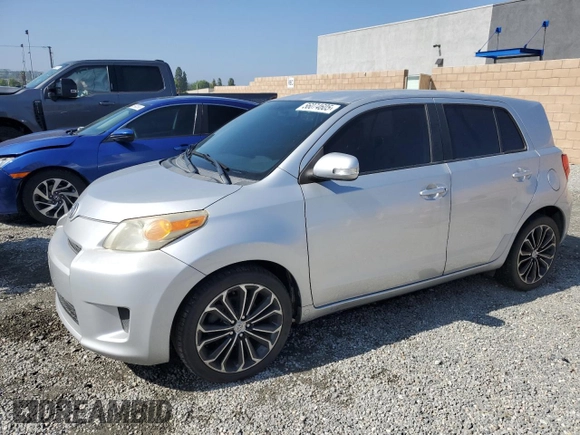 2010 Scion xD with VIN JTKKU4B40A1005613, listed as a Copart auction lot 56074605 with 205,505 mi miles and Clean Title. Bid and sale history available at DreamBid. Image 1.