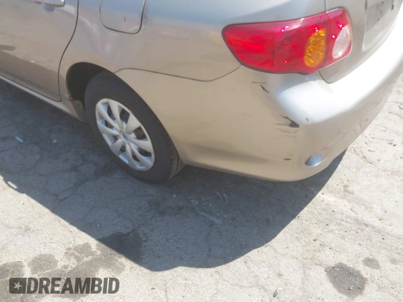 2010 Toyota Corolla with VIN 1NXBU4EE9AZ295128, listed as a IAAI auction lot 42118631 with 197,839 mi miles. Bid and sale history available at carsss.com. Image 6.