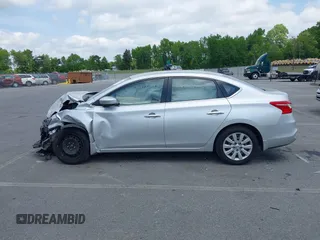 2019 Nissan Sentra S z VIN 3N1AB7AP6KY205658, wystawiony jako IAAI lot #42151392 z przebiegiem 80 395 mil mil oraz . Historia ofert i sprzedaży dostępna na DreamBid. Obrazek 14.