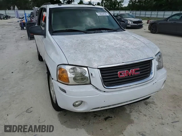 2005 GMC Envoy SLT with VIN 1GKDT13S052311455, listed as a Copart auction lot 73635434 with Not Provided miles and Salvage Title. Bid and sale history available at DreamBid. Image 12.