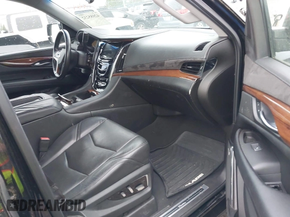 2015 Cadillac Escalade ESV Premium z VIN 1GYS4TKJ3FR726972, wystawiony jako IAAI lot #42085232 z przebiegiem 234 115 mil mil oraz . Historia ofert i sprzedaży dostępna na DreamBid. Obrazek 5.