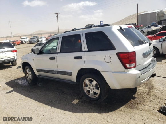 2005 Jeep Grand Cherokee Laredo with VIN 1J4HR48N55C600173, listed as a Copart auction lot 49164965 with 84,100 mi miles and Salvage Title. Bid and sale history available at carsss.com. Image 2.